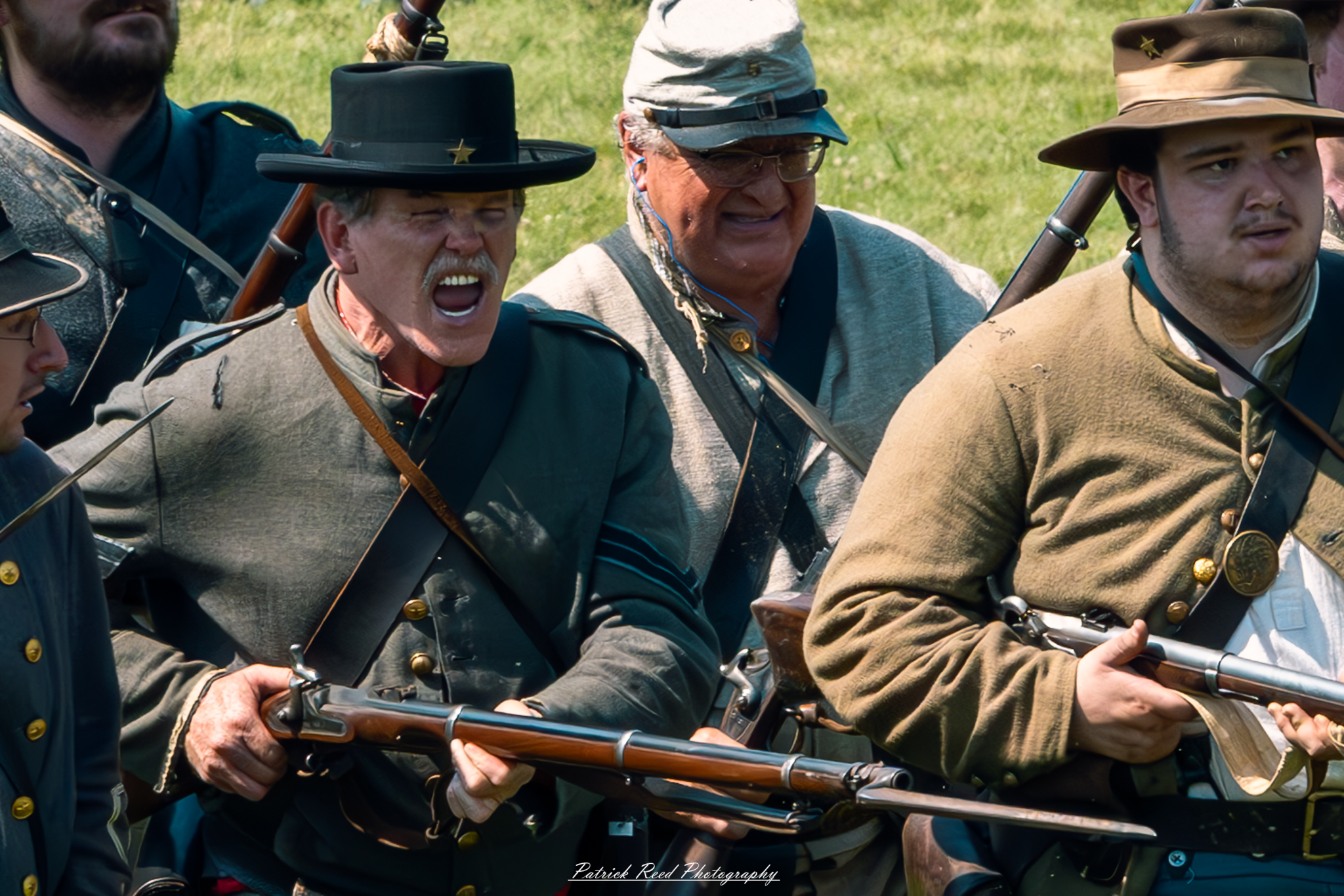 A Confederate soldier screaming in defiance while charging forward, his face contorted with determination and intensity. Dressed in a gray uniform and wielding a weapon, he embodies the fervor and bravery of battle, capturing the chaos and urgency of the moment as he leads his comrades into action.